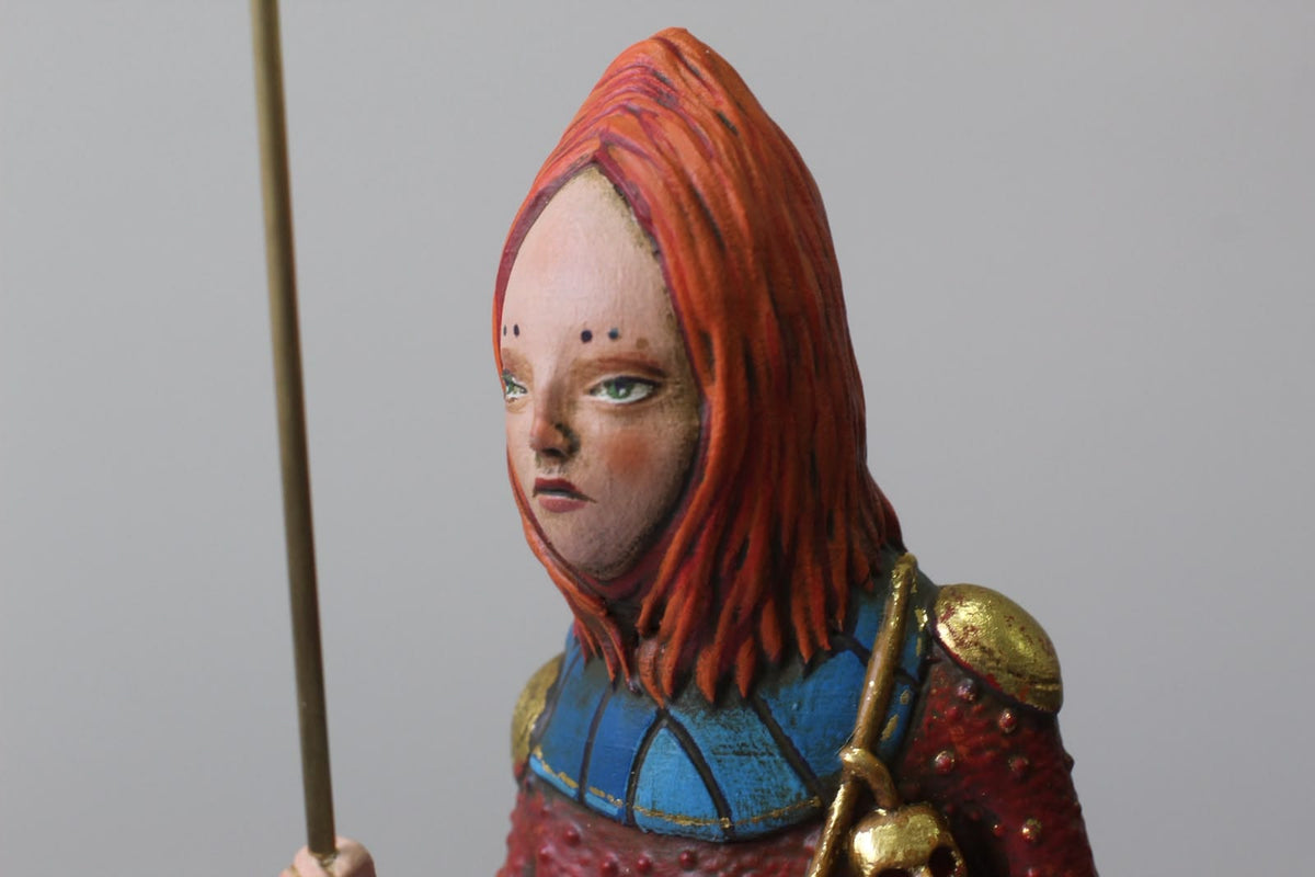 A Dama Ruiva e o Cordeiro.
